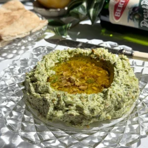 10-minute whipped feta with honey and crushed pistachios in a vintage glass bowl, served with pita bread.