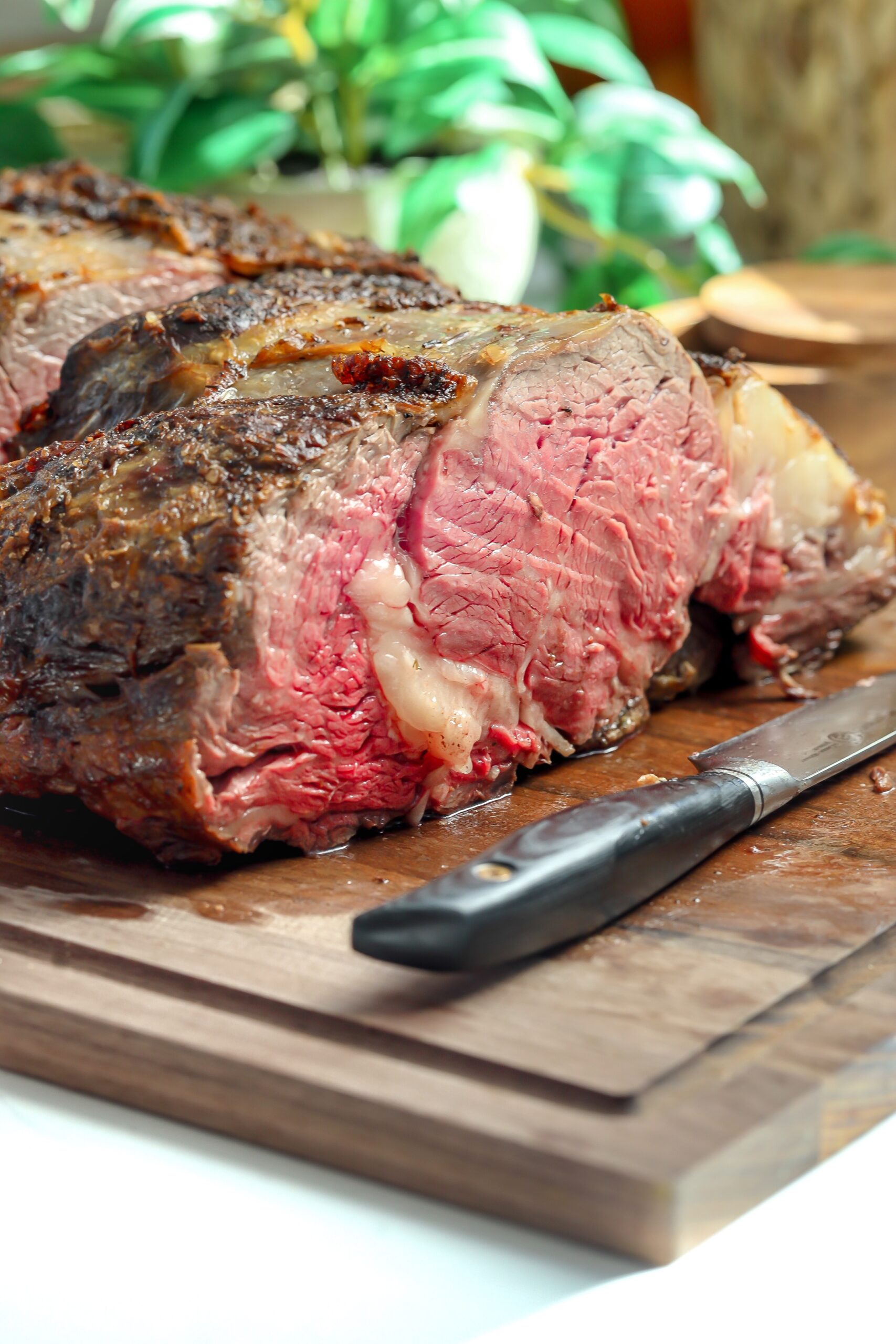 Rested medium rare prime rib sliced and ready to serve