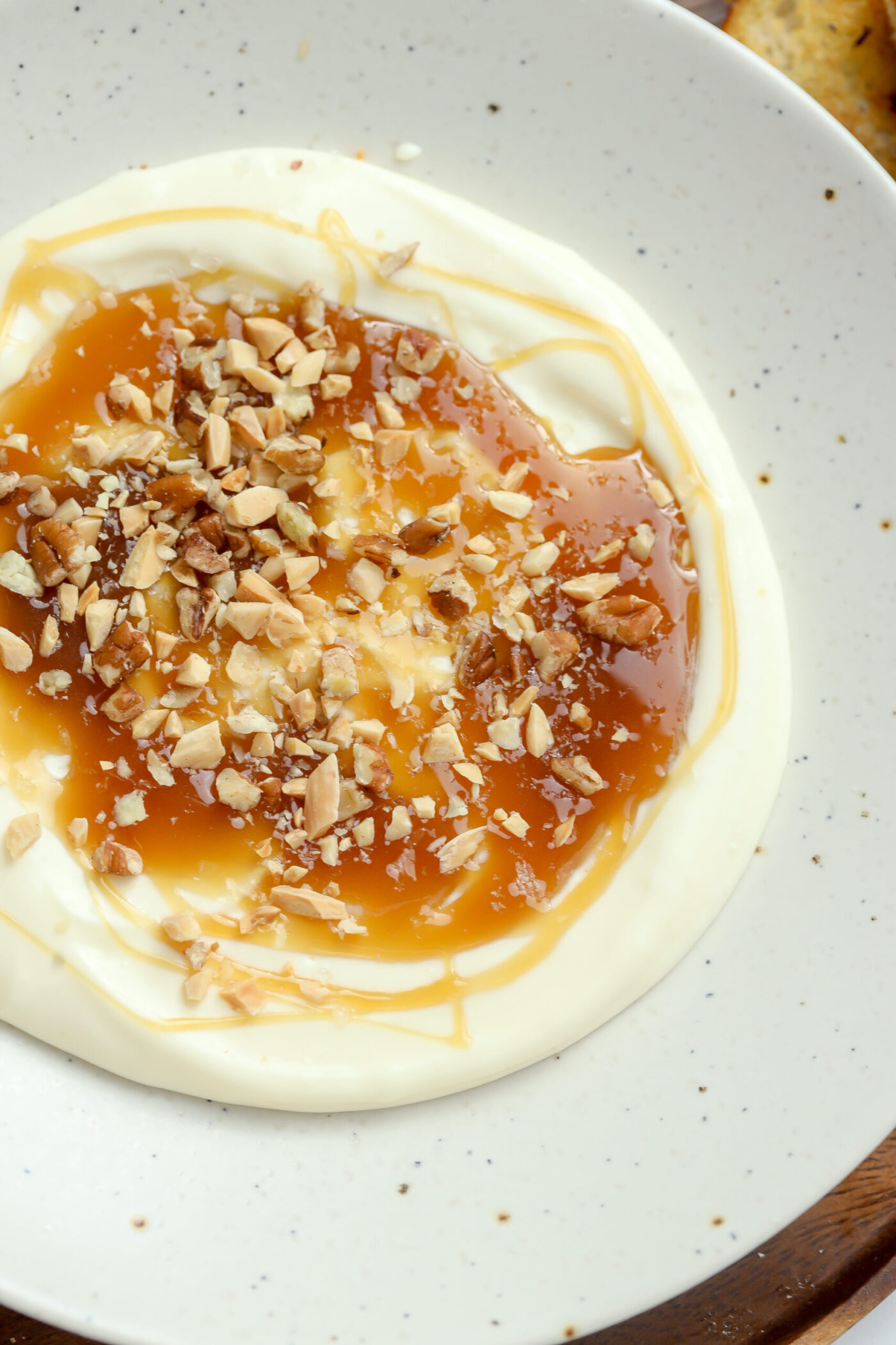 Whipped brie and cream cheese with apple caramel and toasted nuts.