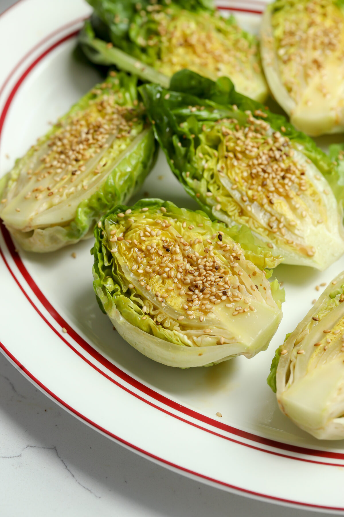 a easy to make handheld crunchy romaine lettuce with a dijon mustard salad dressing.