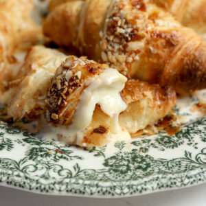 Croissants stuffed with fig jam and brie and baked in the oven.