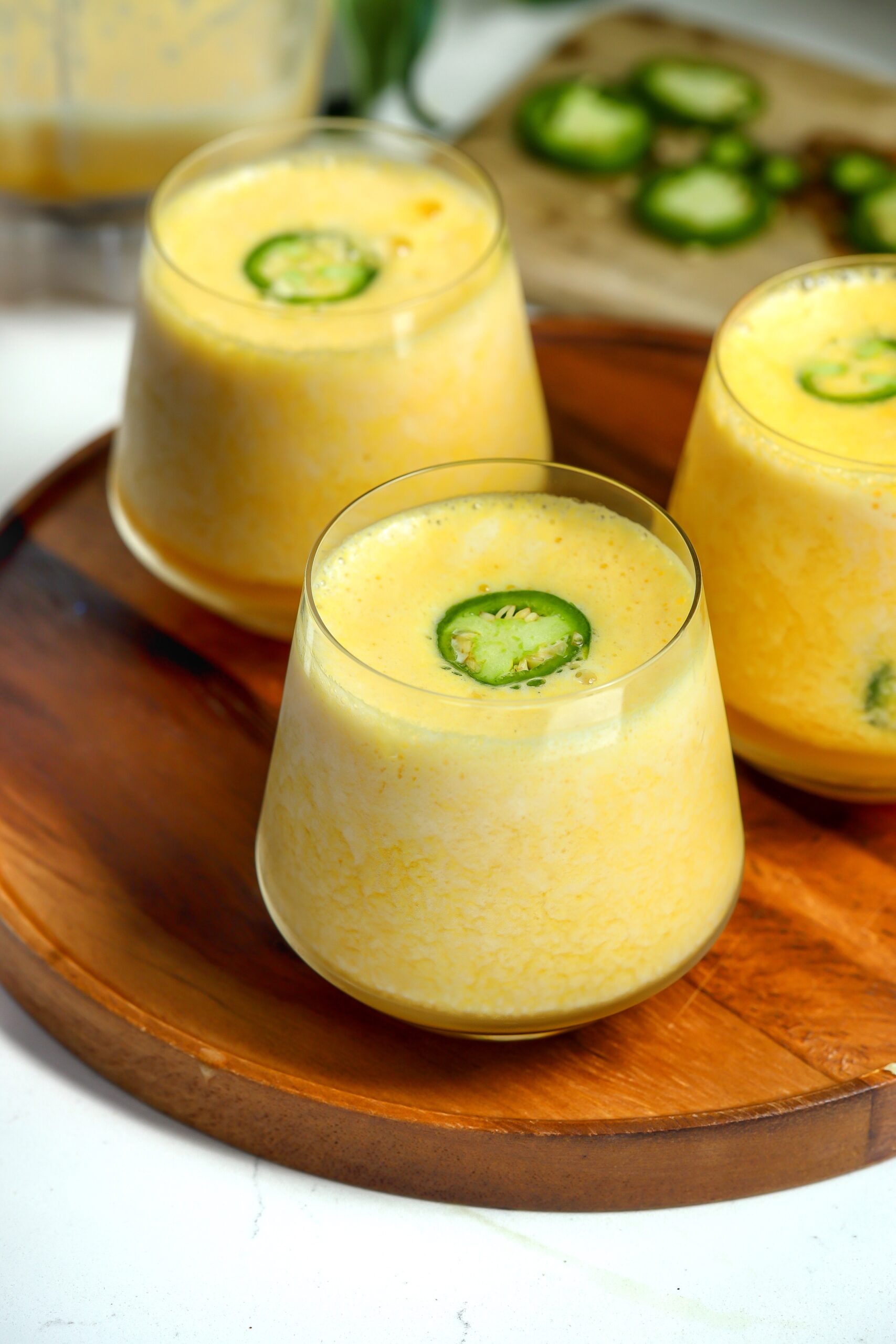 A delicious frozen alcohol wine recipe with a jalapeño on top.