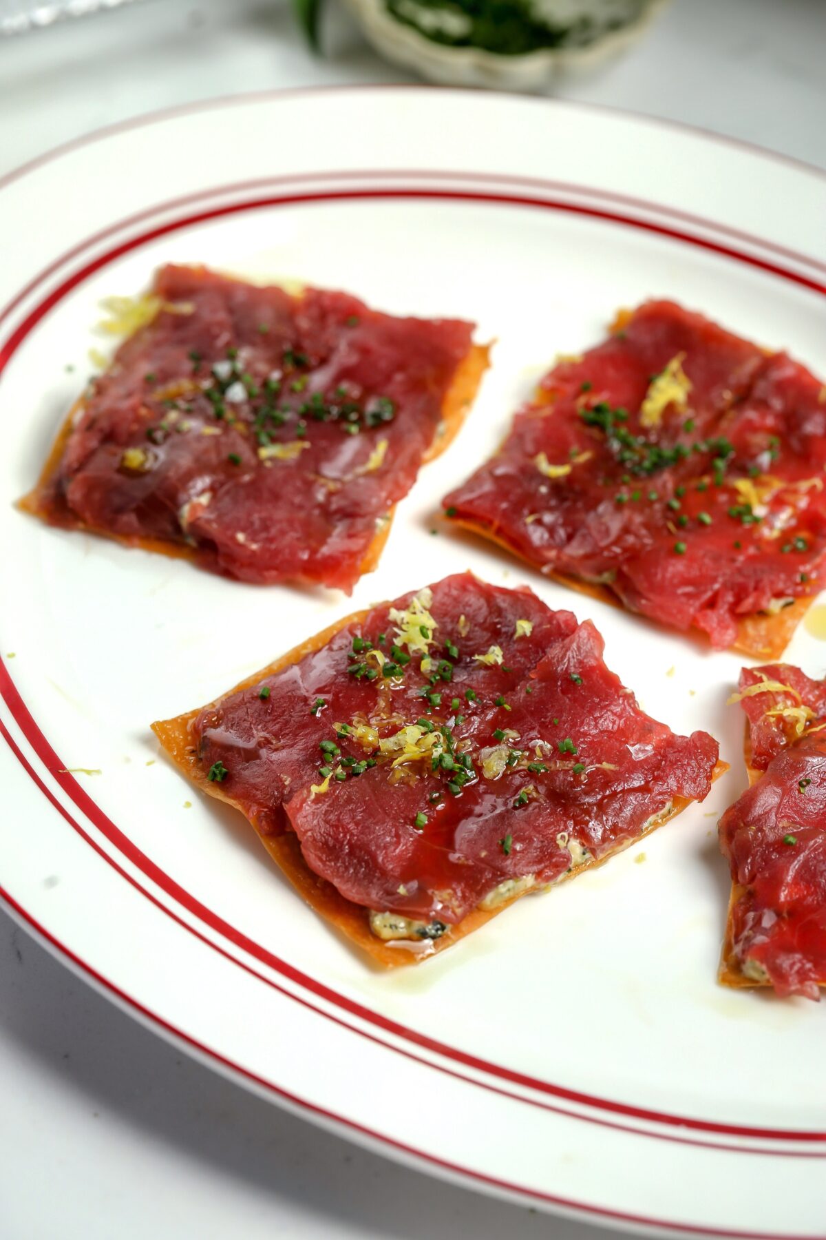A recipe for crispy homemade wonton tostadas with bluefin tuna on top.