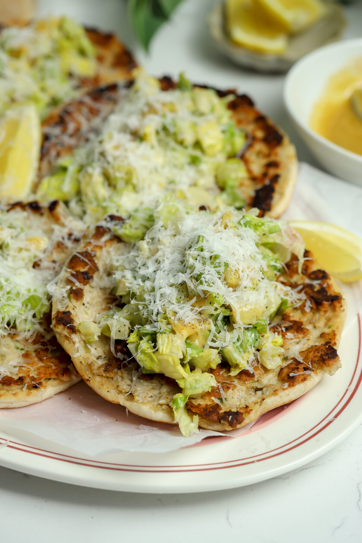 A recipe for Chicken Smash tacos on pita bread with a dressing that gets baked in and topped with shredded lettuce.