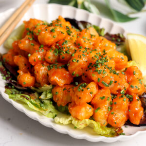 Crispy Rock Shrimp Tempura. a Nobu Style copy cat recipe with a delicious sauce sitting on a bed of yuzu salad.