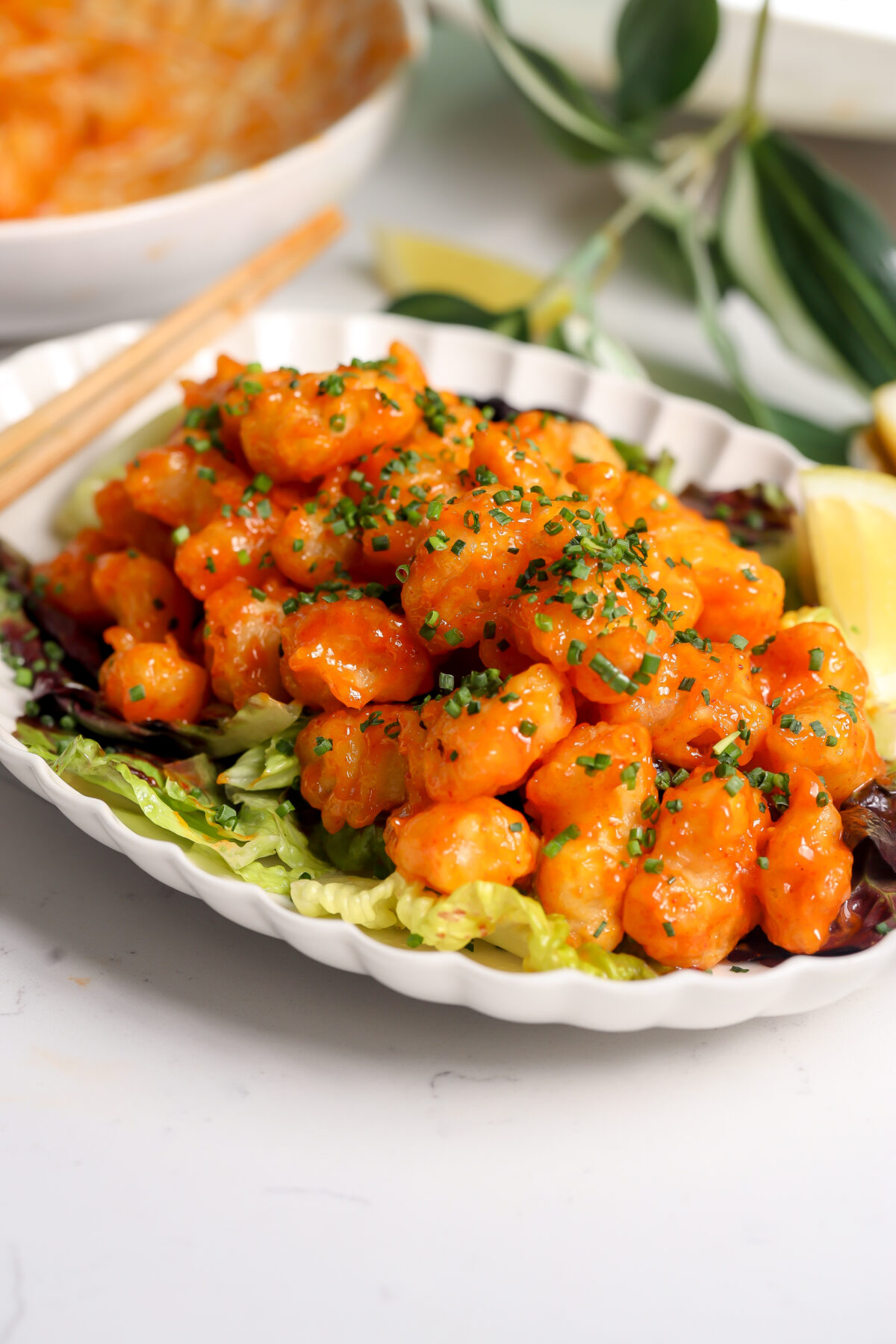 Crispy Rock Shrimp Tempura. a Nobu Style copy cat recipe with a delicious sauce sitting on a bed of yuzu salad.