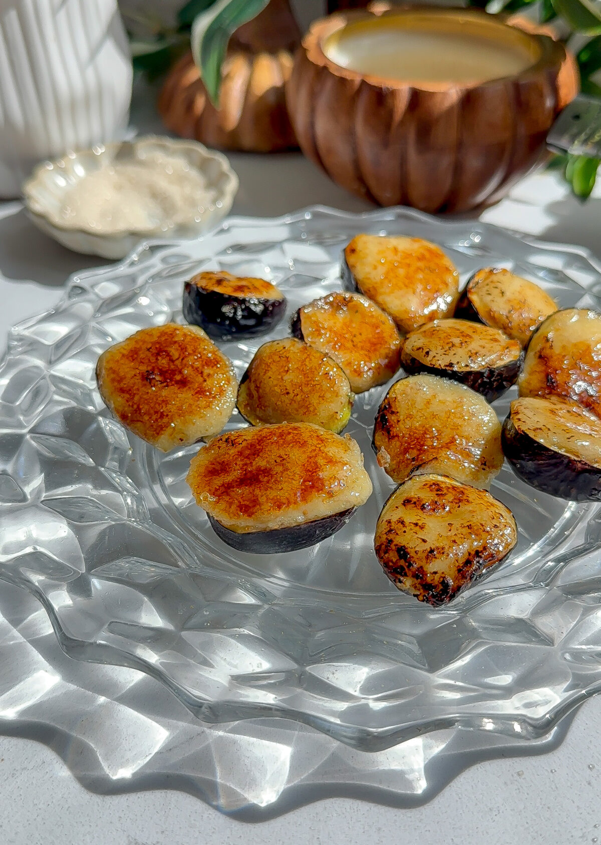 A recipe for an appetizer of figs stuffed with a whipped fig brie with a sugar br&ucirc;l&eacute;e top.