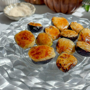 A recipe for an appetizer of figs stuffed with a whipped fig brie with a sugar br&ucirc;l&eacute;e top.