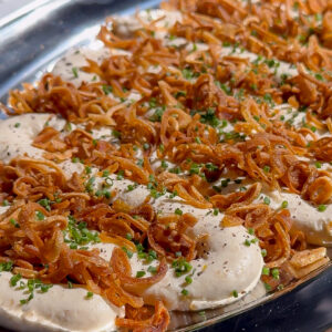 This is a recipe for a cream cheese dip with French onions and crispy onions on top.