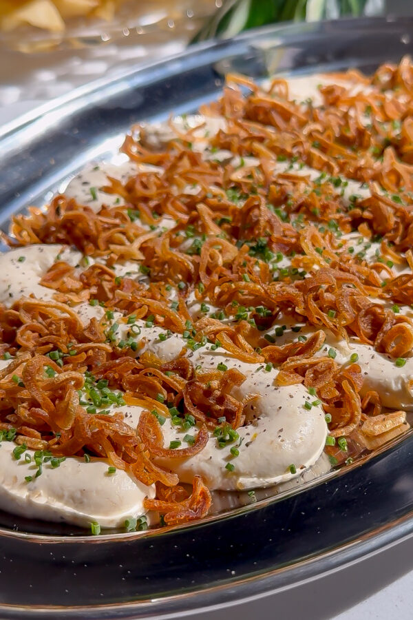 This is a recipe for a cream cheese dip with French onions and crispy onions on top.