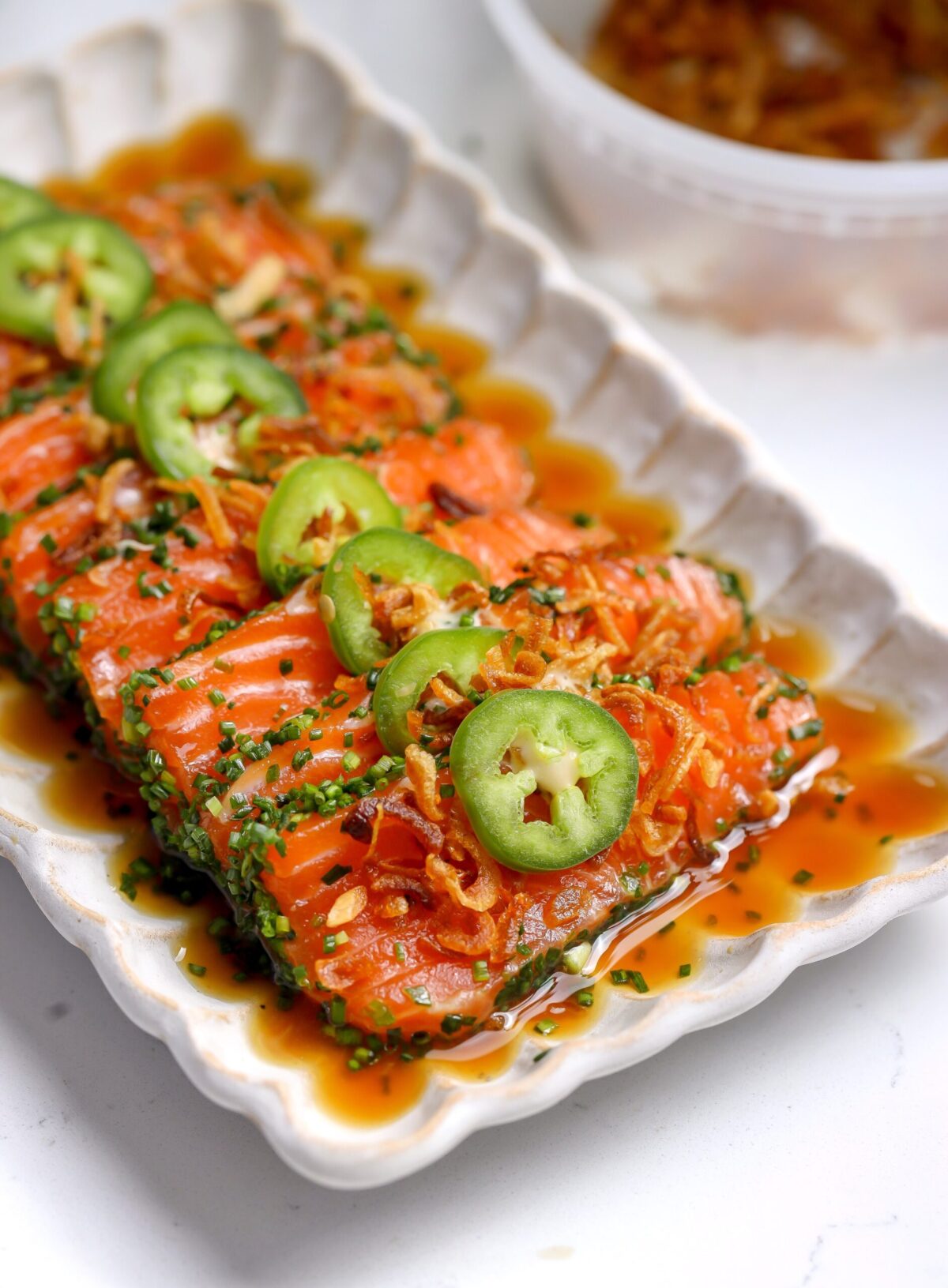 Chive-crusted salmon crudo with yuzu soy and spicy mayo — a fresh, elegant crudo appetizer recipe with crisp chives, jalapeño, and fried shallots.