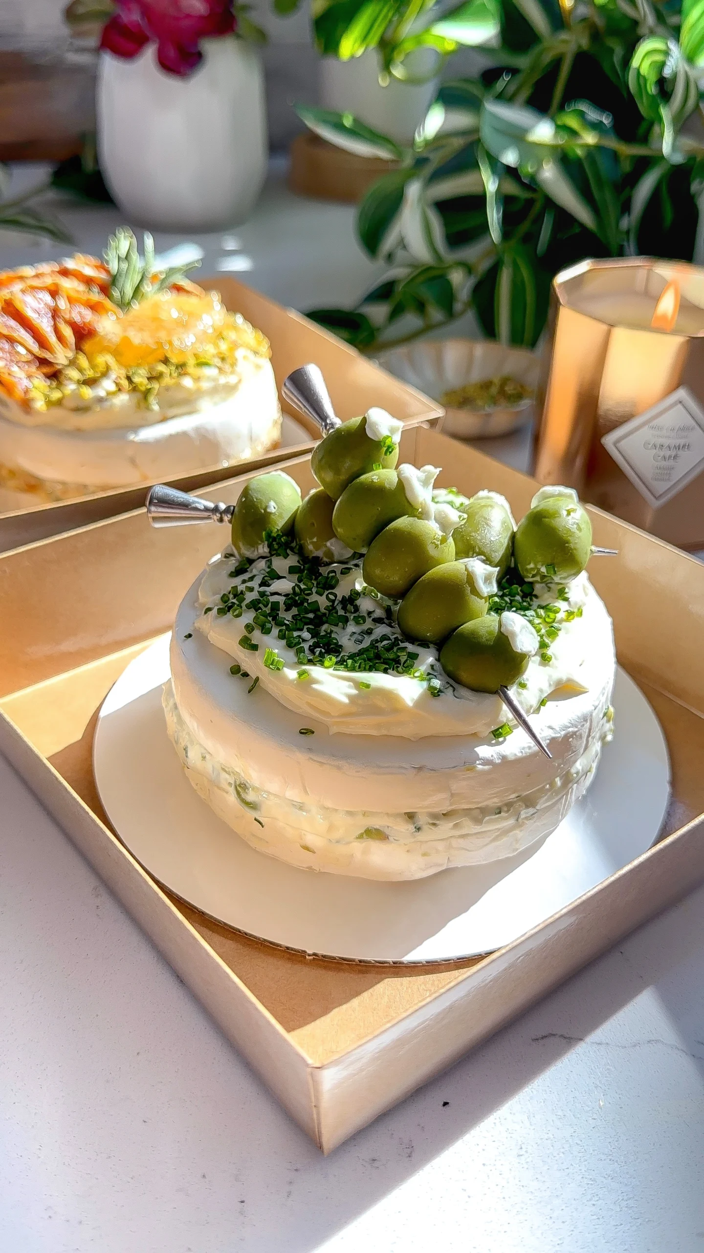 Brie with blue cheese and olive topping