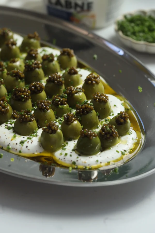Mediterranean labneh dip topped with Castelvetrano olives and caviar.