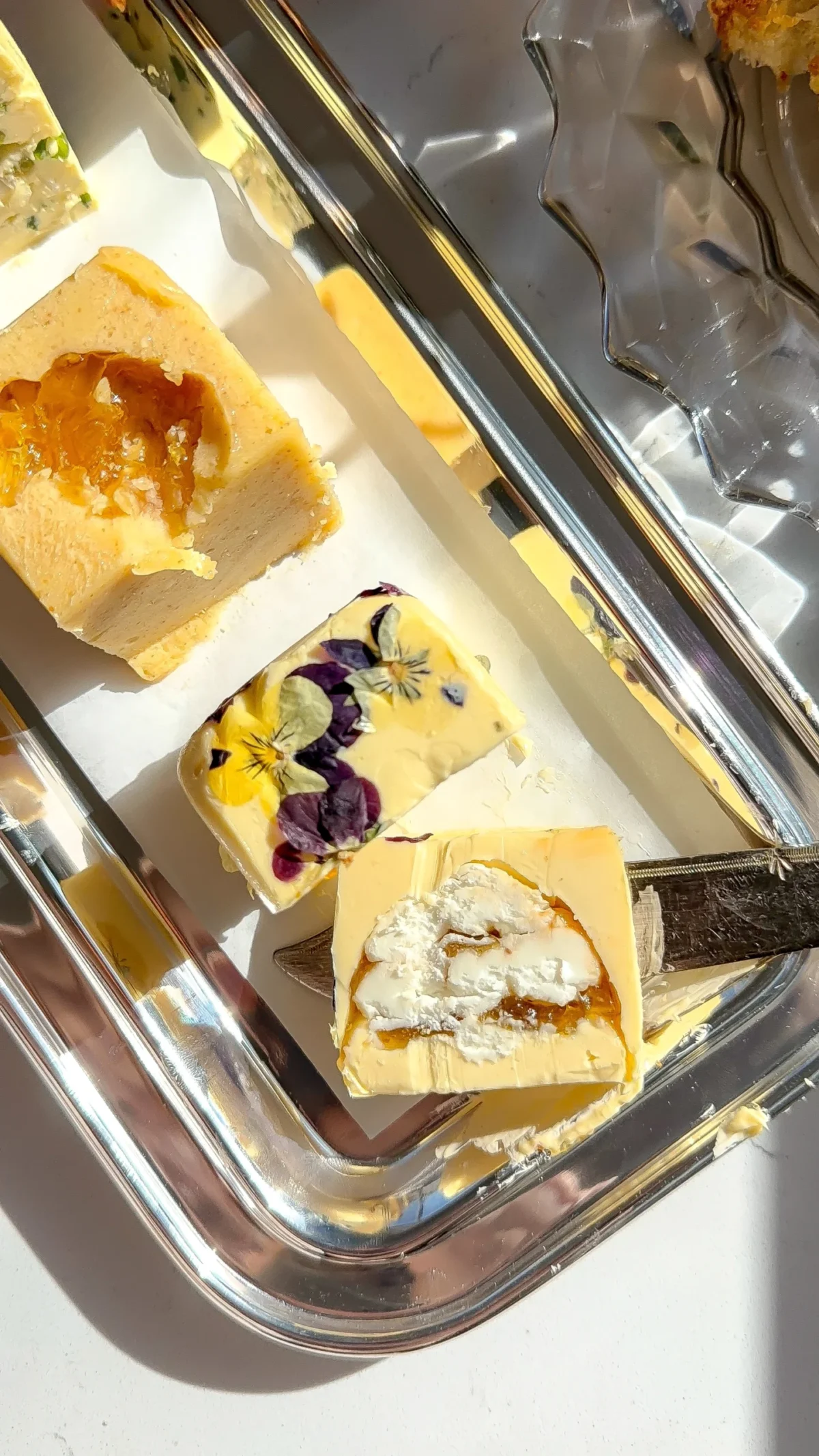 Homemade compound butter flight on a tray with 