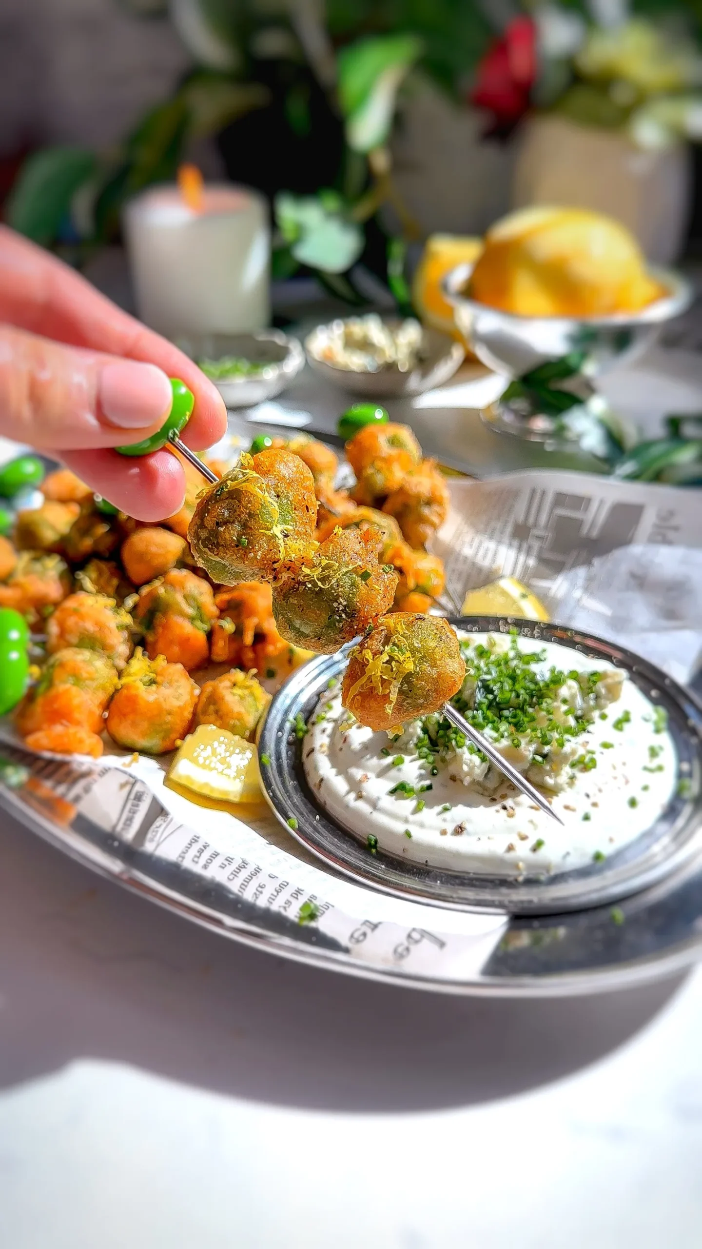crispy fried olives stuffed with blue cheese dipped into olive dip
