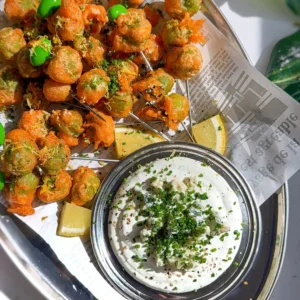 fried olives stuffed with blue cheese served with creamy olive dip