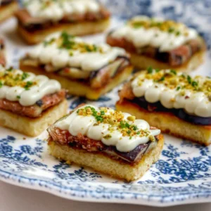 Toasted brioche tartine with whipped brie, fresh figs, honey, and crushed pistachios on fried brioche